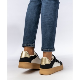 Sneaker femminili con inserti in bianco e nero metallici 1