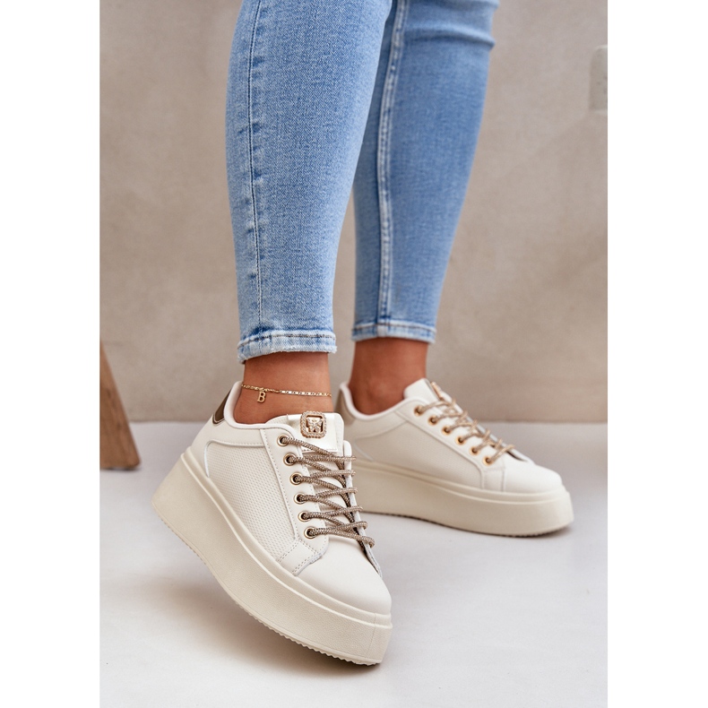 Sneaker su una piattaforma con stringhe decorative beige 2