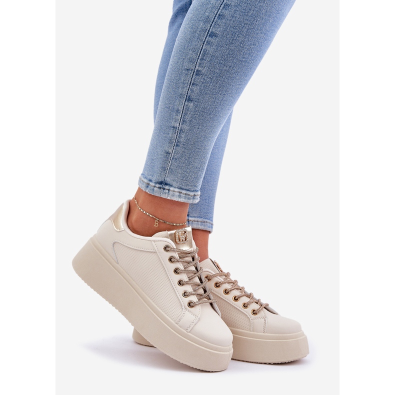 Sneaker su una piattaforma con stringhe decorative beige 1