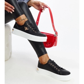 Sneakers in pelle nera sulla suola spessa di Mikka nero 1