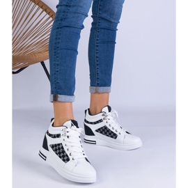 Sneaker bianche da donna su un cuneo nascosto nero 1