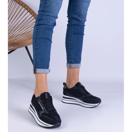 Sneakers nere da donna sulla piattaforma nero 1