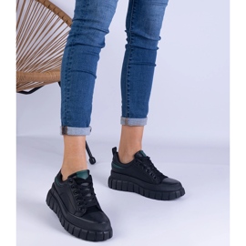 Sneaker da donna nera su una piattaforma alta nero 1