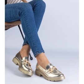Scarpe classiche dorate con decorazione dorata d'oro 1