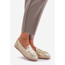 Espadrille da donna con una treccia di iuta su una suola d'oro piatta 1