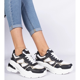 Sneaker da donna nera decorate con glitter nero 1