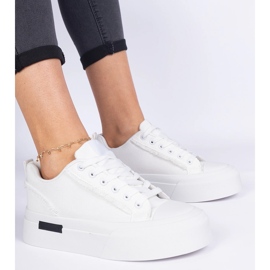 Sneaker materiali da donna bianca sulla piattaforma bianco 1