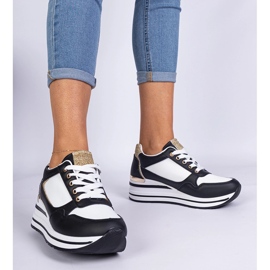 Sneaker nere decorate con glitter e un inserto in metallo nero 1