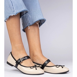 Ballerine femminili beige con un arco 2