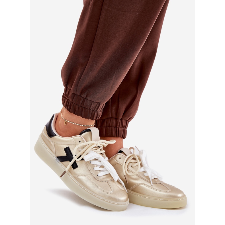 Scarpe sportive da donna basse dorate d'oro 1