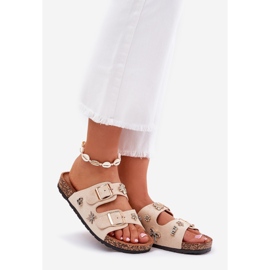 Pantofole da donna su una suola di sughero con fibbie e spille beige 1