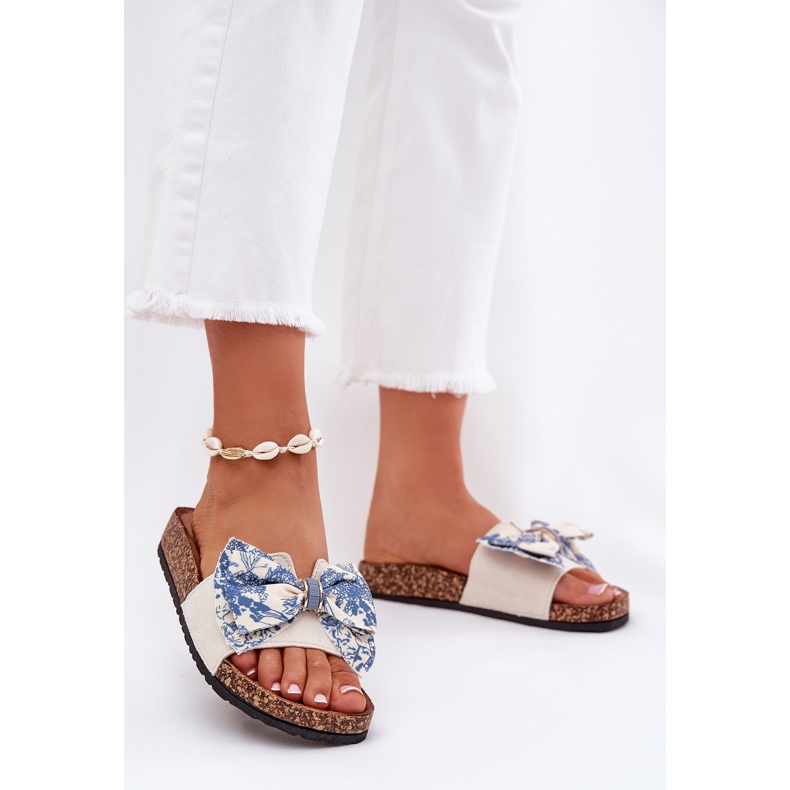 Pantofole da donna con un arco sulla piattaforma di sughero blu beige 2