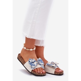 Pantofole da donna con un arco sulla piattaforma di sughero blu beige 1
