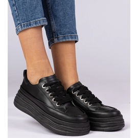 Sneaker da donna nera su una suola alta nero 2