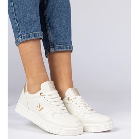 Sneaker da donna beige con broccato dorato 1