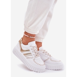 Sneaker femminili sulla piattaforma d'oro 1
