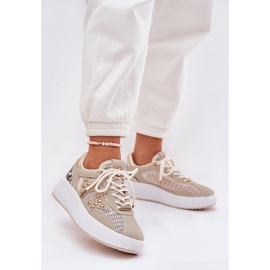 Scarpe sportive femminili con maglia e stalloni beige 2