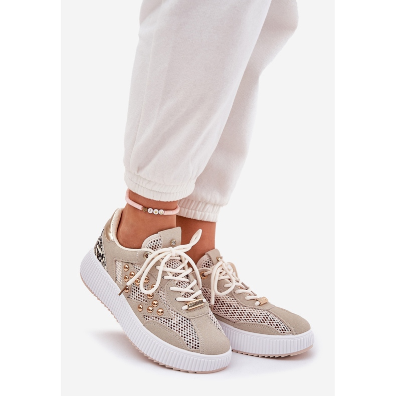 Scarpe sportive femminili con maglia e stalloni beige 1