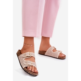 Le infradito del materiale delle donne su una piattaforma di sughero con fibbie beige 1