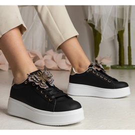 Sneaker nere decorate con una farfalla con zirconi nero 1