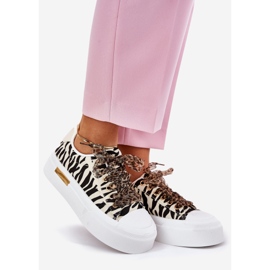 Sneaker femminili con allacciatura decorativa e beige 1