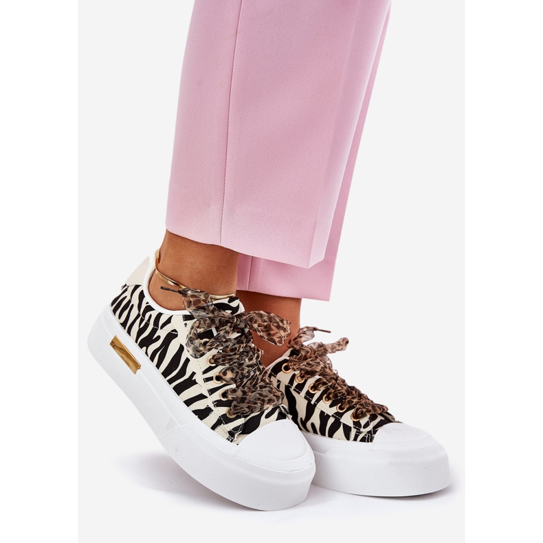 Sneaker femminili con allacciatura decorativa e beige 1