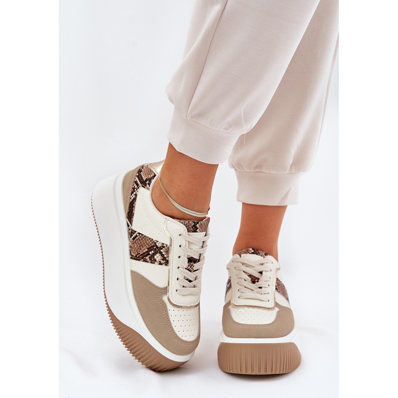 Sneaker femminili su una piattaforma enorme, beige del modello animale 2