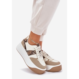 Sneaker femminili su una piattaforma enorme, beige del modello animale 1