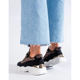 Sneakers nere da donna con motivo nero 1