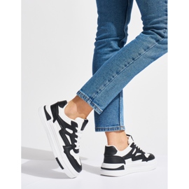 Sneakers con plateau in bianco e nero 1