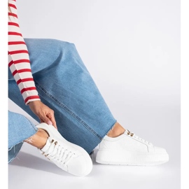 Sneakers in pelle bianca con plateau 1