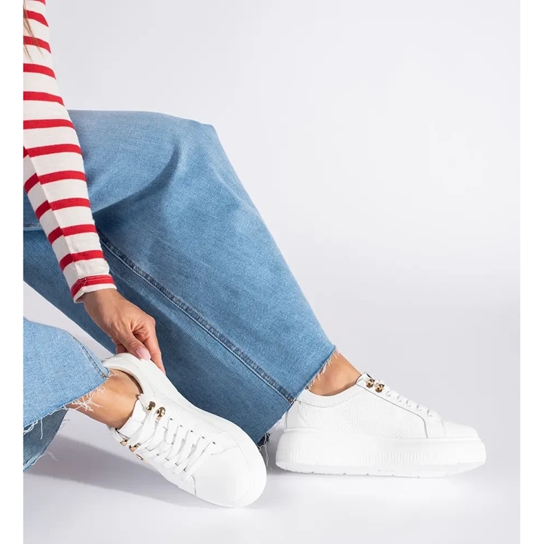 Sneakers in pelle bianca con plateau 1