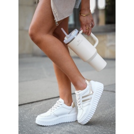 Sneaker femminili sulla piattaforma d'oro 2