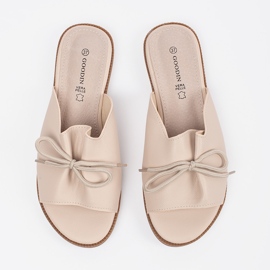 Goodin Flap di beige con un arco 1