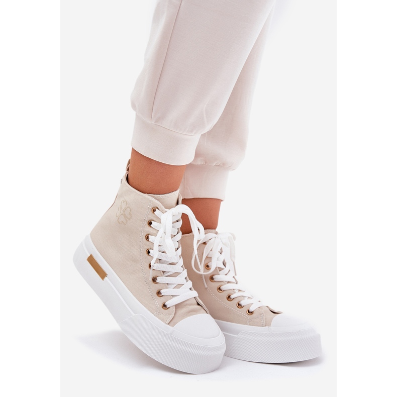 Sneaker da donna alte sulla piattaforma beige 1
