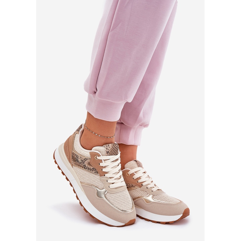 Scarpe sportive femminili su piattaforma di animali beige 1