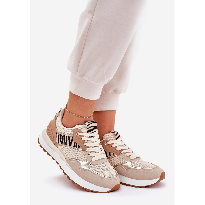 Scarpe sportive femminili sulla piattaforma zebra beige 1