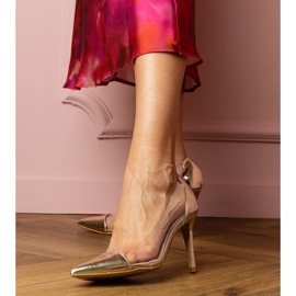 Pompe classiche dorate con tomaia trasparente d'oro 1