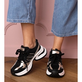 Sneaker sportive nere su una suola enorme nero 1