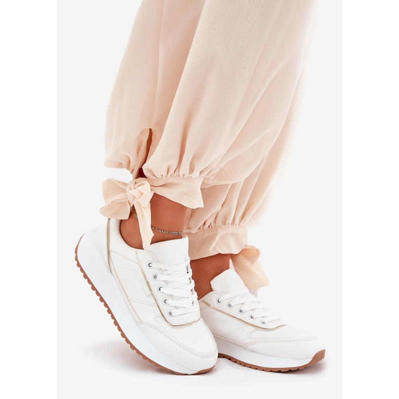 Scarpe sportive femminili su piattaforma bianca bianco 1
