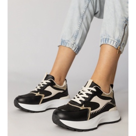 Sneaker sportive nere con un inserto intrecciato nero 1