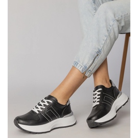 Sneaker sportive nere con un inserto d'argento nero 2
