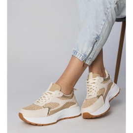 Sneaker sportive beige con un inserto intrecciato 2