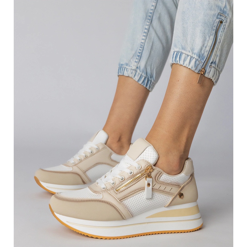 Sneaker sportive beige decorate con un cursore 1