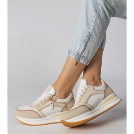 Sneaker sportive beige decorate con un cursore 2