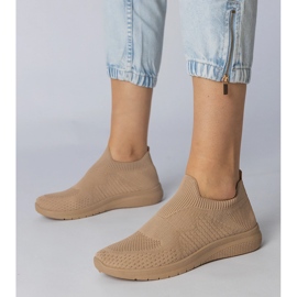 Sneaker sportive beige con una tomaia di socking 1