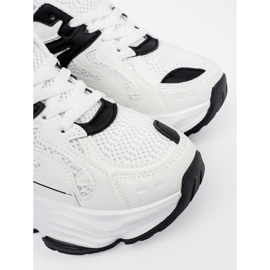 Sneaker femminili su una sima bianca spessa bianco 1