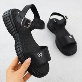 Sandali in pelle da donna su una suola spessa con una farfalla nera filippo ds6811 nero 1