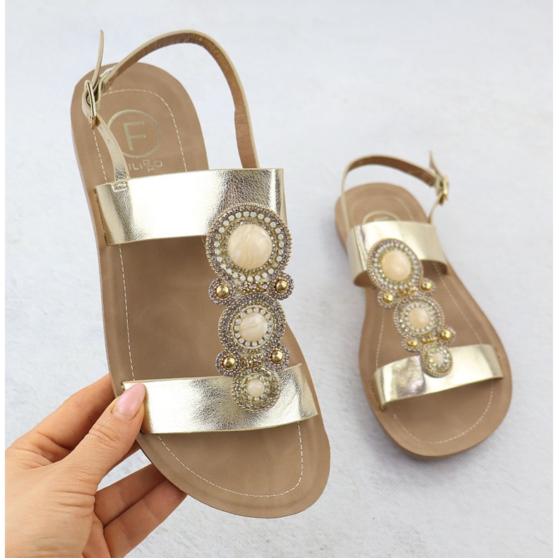 Sandali da donna piatta con un ornamento metallico dorato Filippo DS6882 d'oro 1