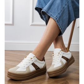 Sneaker leopardate da donna sulla piattaforma bianca 2